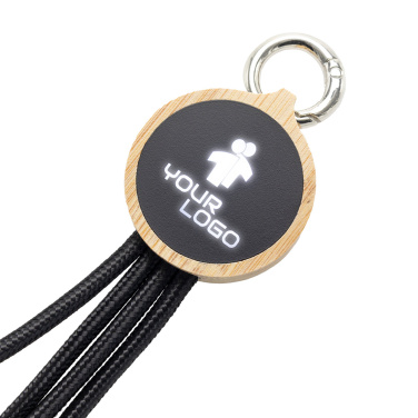 Logotrade Geschäftsgeschenke das Foto: 4-in-1-Kabel mit elighted-Logo im Holzgehäuse, LH-ZMU05