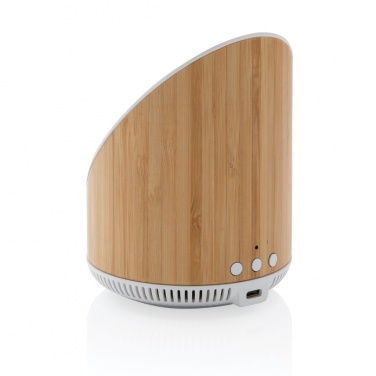 Logotrade corporate gifts photo of: Ovate bamboo 5W speaker with 15W wireless charger